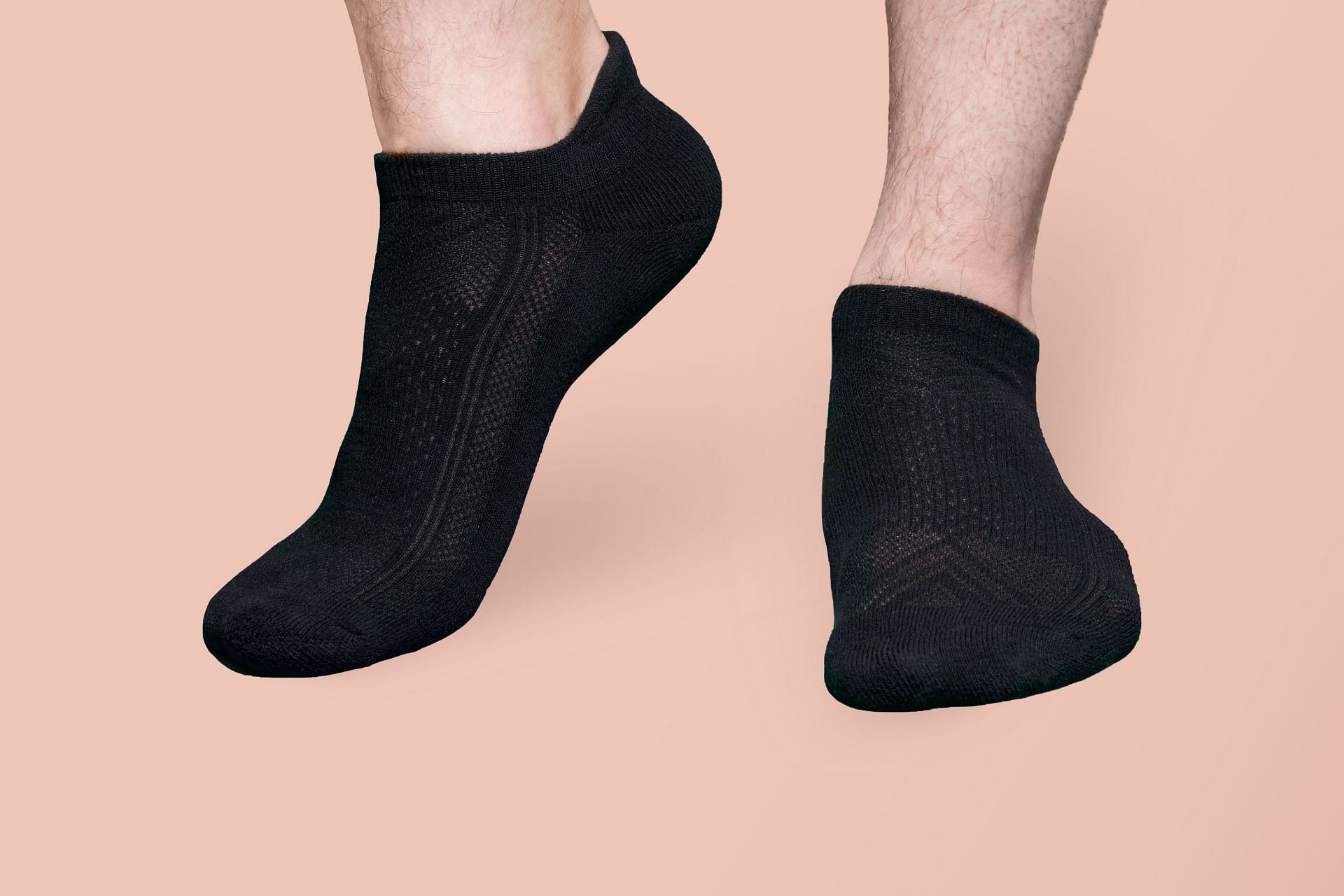 It's important to keep the boot dry and clean. (Image via Unsplash/Invictus Tailoring Sneaker Socks)